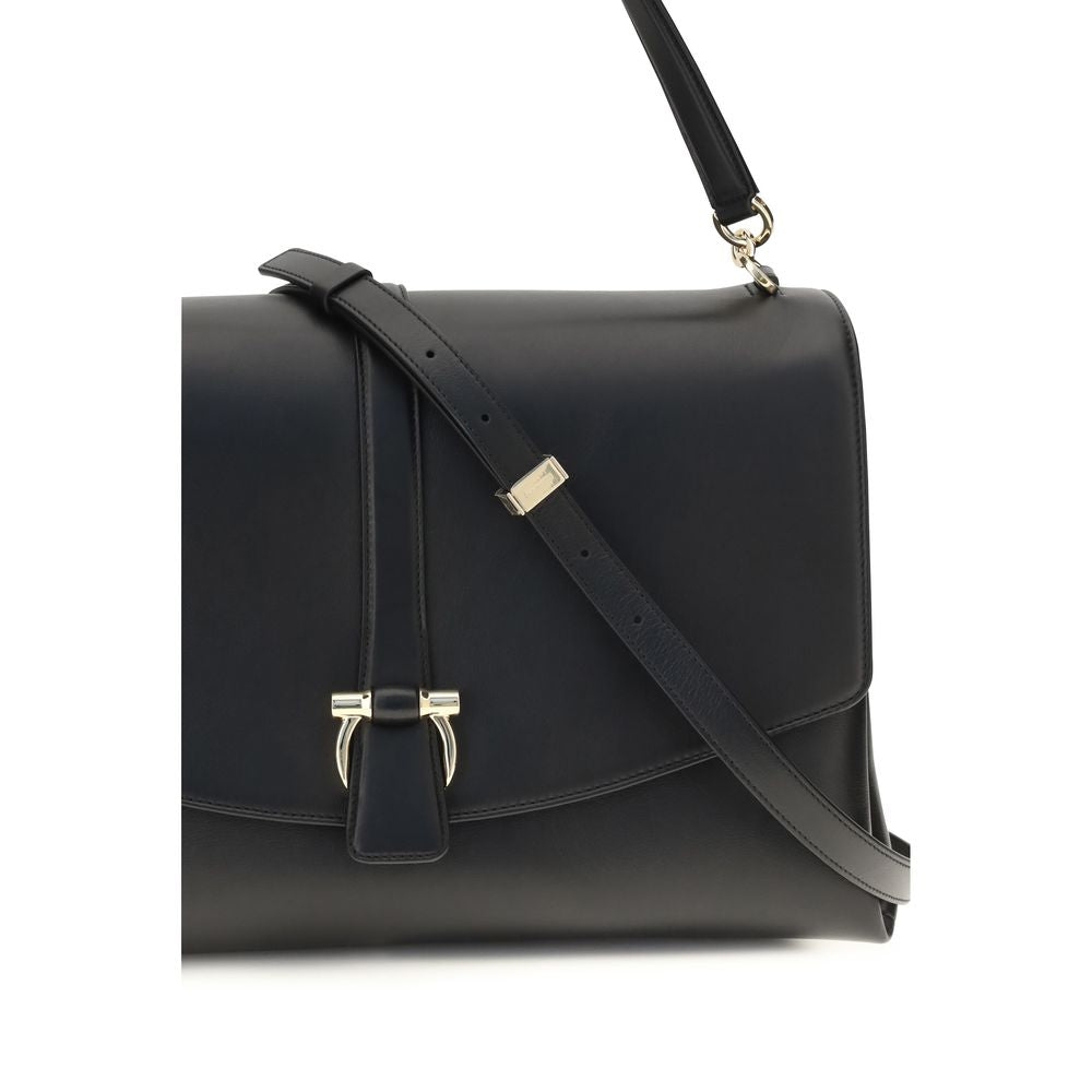 Large Shoulder Flap Clutch Bag by Ferragamo for women in bos taurus calf leather black features a enviable silhouette, showcasing a secure flap, ample , and enviable shoulder-strap & handle for a enviable finish.