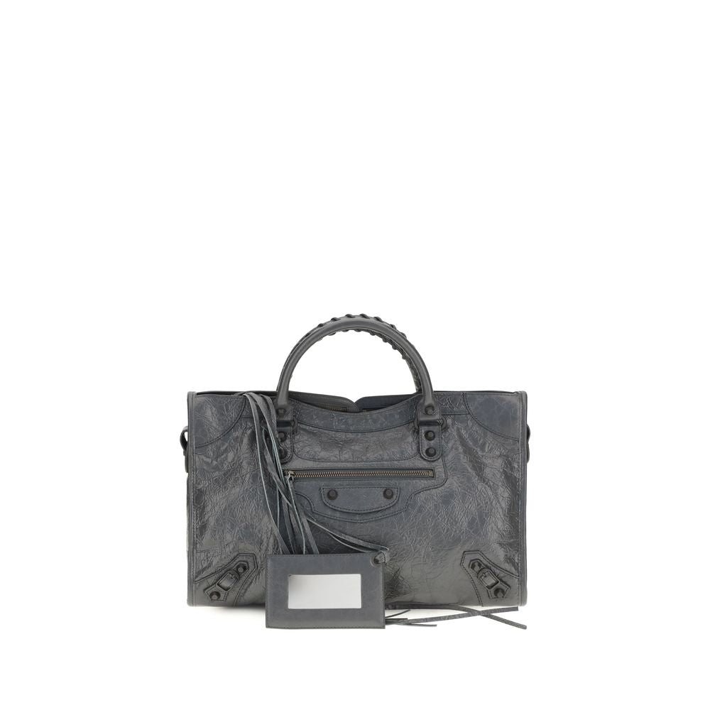 Medium Handbag by Balenciaga for women in cotton canvas & lamb leather gray presents a ornamental silhouette, showcasing a secure zipper, ample , and versatile shoulder-strap, adjustable-strap & handle for a ornamental finish.