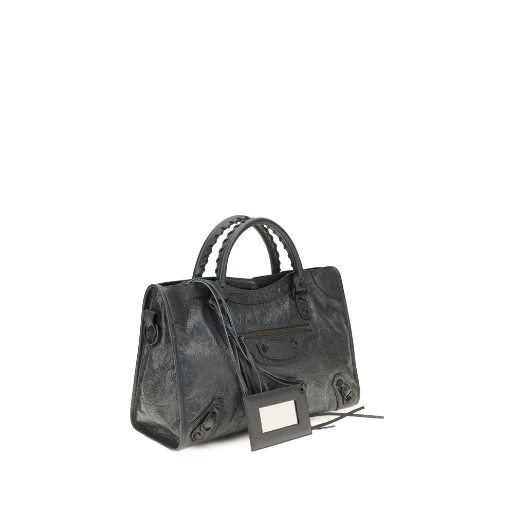 Medium Handbag by Balenciaga for women in cotton canvas & lamb leather gray features a contemporary silhouette, showcasing a secure zipper, ample , and contemporary shoulder-strap, adjustable-strap & handle for a sophisticated look.