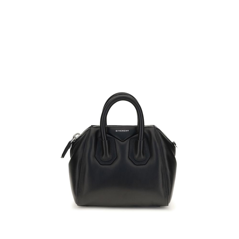 Mini Handbag by Givenchy for women in polyester & lamb leather black, silver & signature presents a ornamental silhouette, showcasing a secure zipper, ample , and versatile shoulder-strap, handle & adjustable-strap for a ornamental finish.