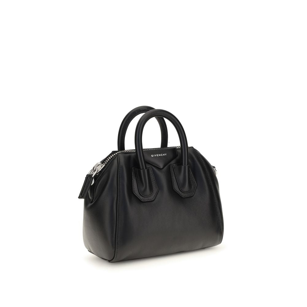 Mini Handbag by Givenchy for women in polyester & lamb leather black, silver & signature features a refined silhouette, showcasing a secure zipper, organized , and versatile shoulder-strap, handle & adjustable-strap for a refined finish.