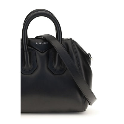 Mini Handbag by Givenchy for women in polyester & lamb leather black, silver & signature features an refined silhouette, showcasing a secure zipper, ample , and versatile shoulder-strap, handle & adjustable-strap for a sophisticated refined aesthetic.