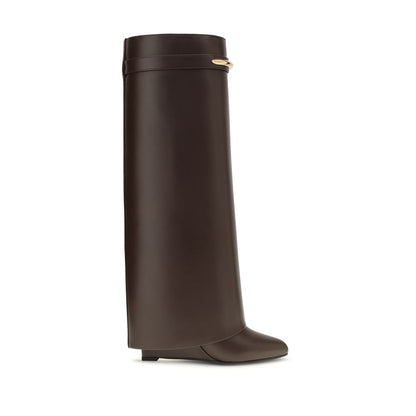 High-Heel Wedge Boots by Givenchy for women in bos taurus calf leather brown & gold features an avant-garde Women's Bos Taurus Calf Leather High-Heel Wedge Boots silhouette, defined by a sophisticated high-heel wedge and a avant-garde pointed toe style.