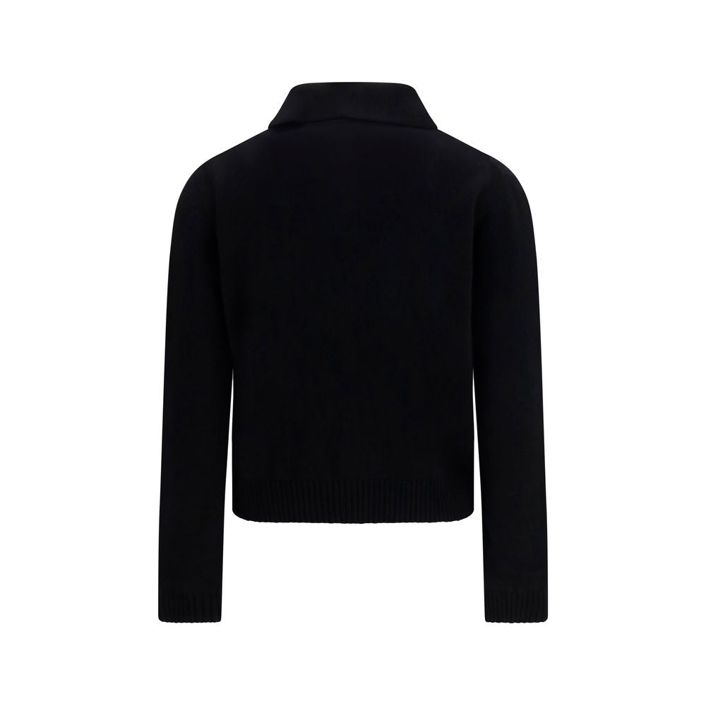 This Sweater by Givenchy for women in cashmere wool & capra leather black & signature presents a understated silhouette, featuring a sophisticated and for a understated finish.