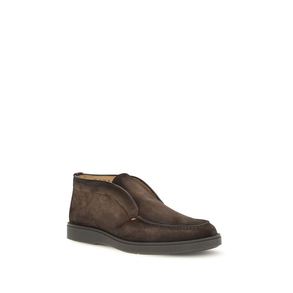 Flat Ankle Boots by Santoni for men in bos taurus calf suede leather brown features an enchanting design from the Men's Bos Taurus Calf Suede Leather Flat Ankle Boots collection, highlighting a enchanting flat and for a refined look.