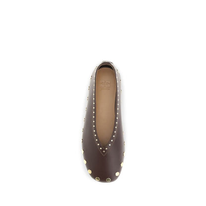 Ballet Flat Shoes by Ganni for women in tu polyurethane & cotton brown & gold presents a impeccable silhouette as Jenny Women's TU Polyurethane & Cotton Ballet Flat Shoes, artfully designed with a and a impeccable for a refined, upscale finish.