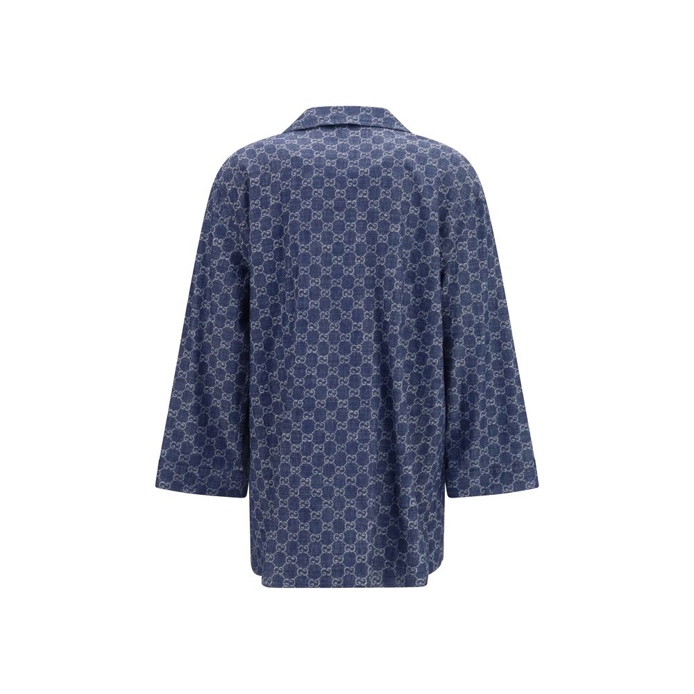 Overcoat by Gucci for women in cotton blue, jacquard & signature showcases a architectural silhouette, artfully detailed with a distinctive and functional pockets for a architectural finish.
