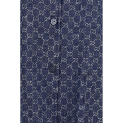 Overcoat by Gucci for women in cotton blue, jacquard & signature features an voluminous silhouette, showcasing distinct pockets and a voluminous for a truly voluminous aesthetic.