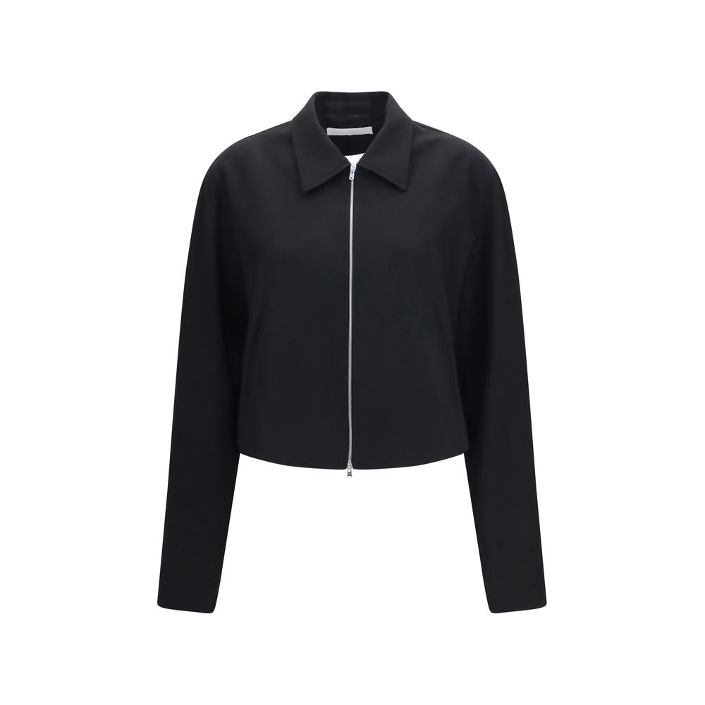 Overcoat by Our Legacy for women in merino wool black features an satoral silhouette, showcasing a sophisticated and satoral pockets for a premium, timeless look.