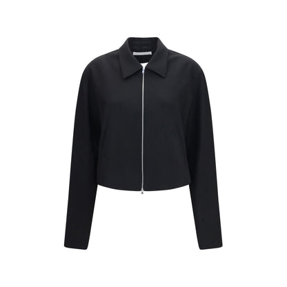 Overcoat by Our Legacy for women in merino wool black features an satoral silhouette, showcasing a sophisticated and satoral pockets for a premium, timeless look.
