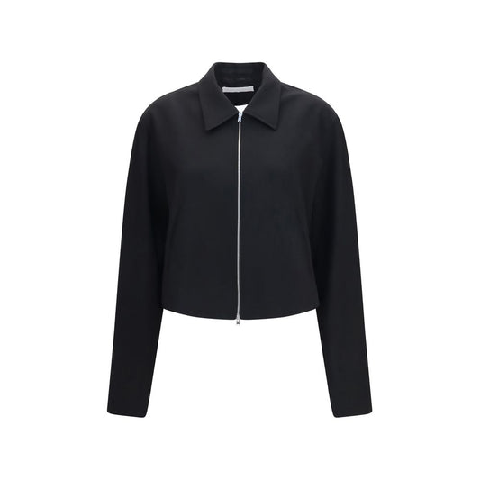 Overcoat by Our Legacy for women in merino wool black features an satoral silhouette, showcasing a sophisticated and satoral pockets for a premium, timeless look.