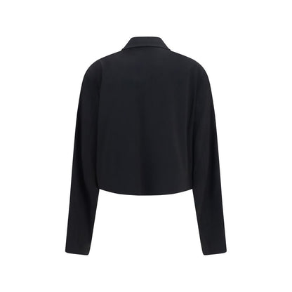 Overcoat by Our Legacy for women in merino wool black presents a luxurious silhouette, showcasing a luxurious and sophisticated pockets for a premium, luxurious look.