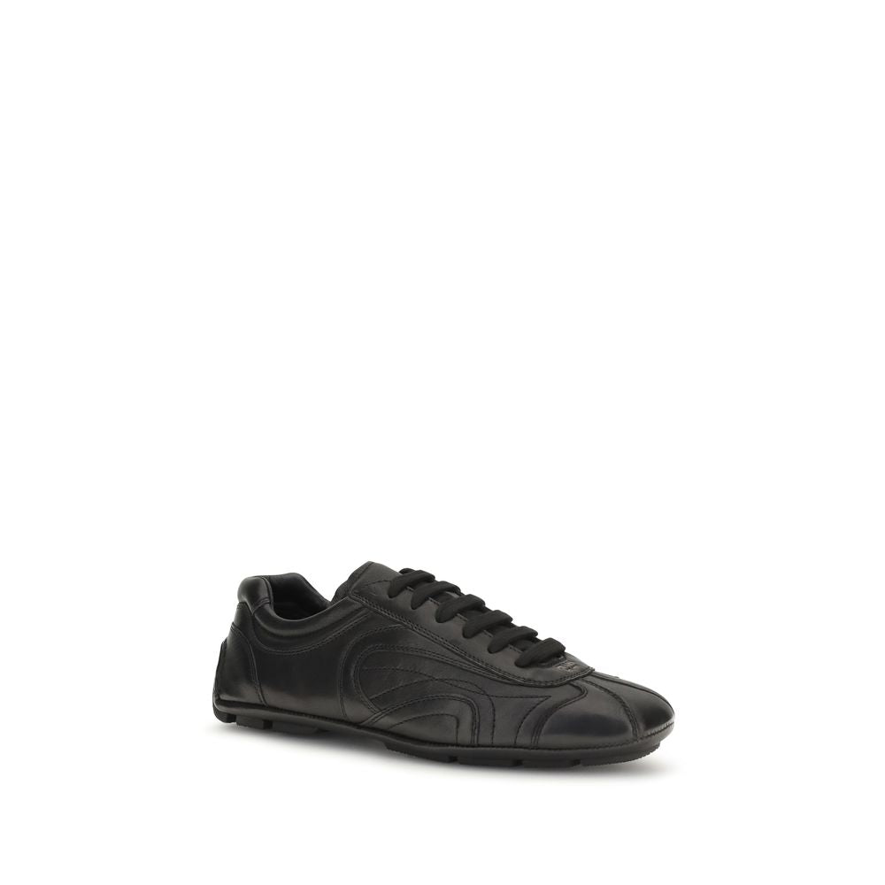 Sneakers by Prada for men in leather & rubber black features an timeless silhouette from the Men's Low Top Leather & Rubber Sneakers collection, showcasing a signature low-top style with an timeless finish.