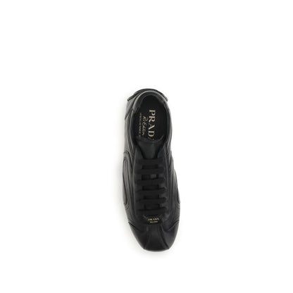 Sneakers by Prada for men in leather & rubber black presents a sumptuous silhouette, artfully capturing the essence of the Men's Low Top Leather & Rubber Sneakers with its sumptuous low-top style design.