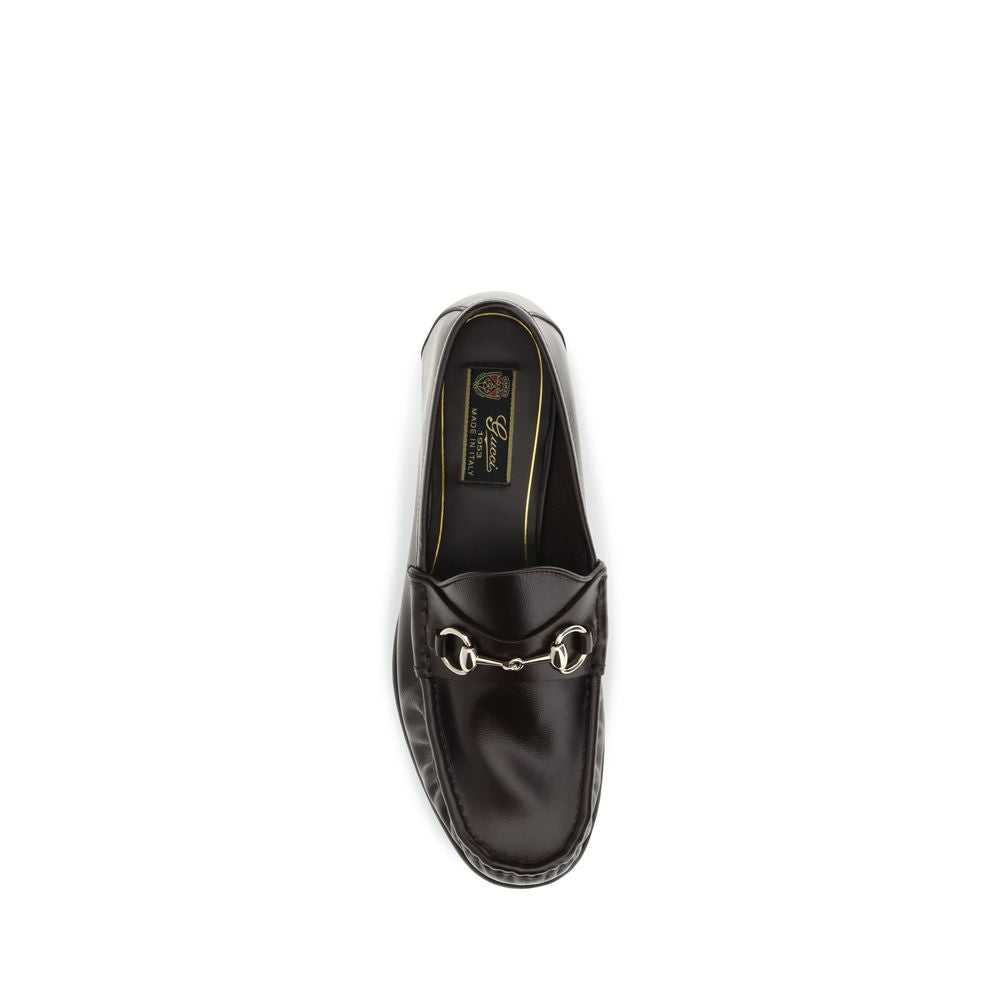Loafer Slip-On Shoes by Gucci for men in bos taurus calf leather brown showcases a impeccable silhouette as Horsebit Men's Bos Taurus Calf Leather Loafer Slip-On Shoes, artfully designed with a impeccable and refined for a impeccable finish.