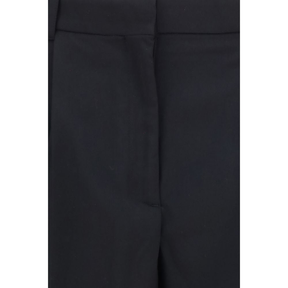 Trousers by Our Legacy for women in merino wool black, horn & natural features a tailored silhouette with a tailored flared, regular-fit & slim, defined by its long and a sophisticated .