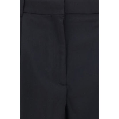 Trousers by Our Legacy for women in merino wool black, horn & natural features a tailored silhouette with a tailored flared, regular-fit & slim, defined by its long and a sophisticated .