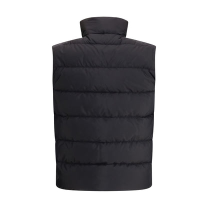 Vest by Prada for men in nylon & goose-down black showcases a dynamic silhouette, perfectly balancing pockets & insulated with a dynamic for a sophisticated, high-fashion look.