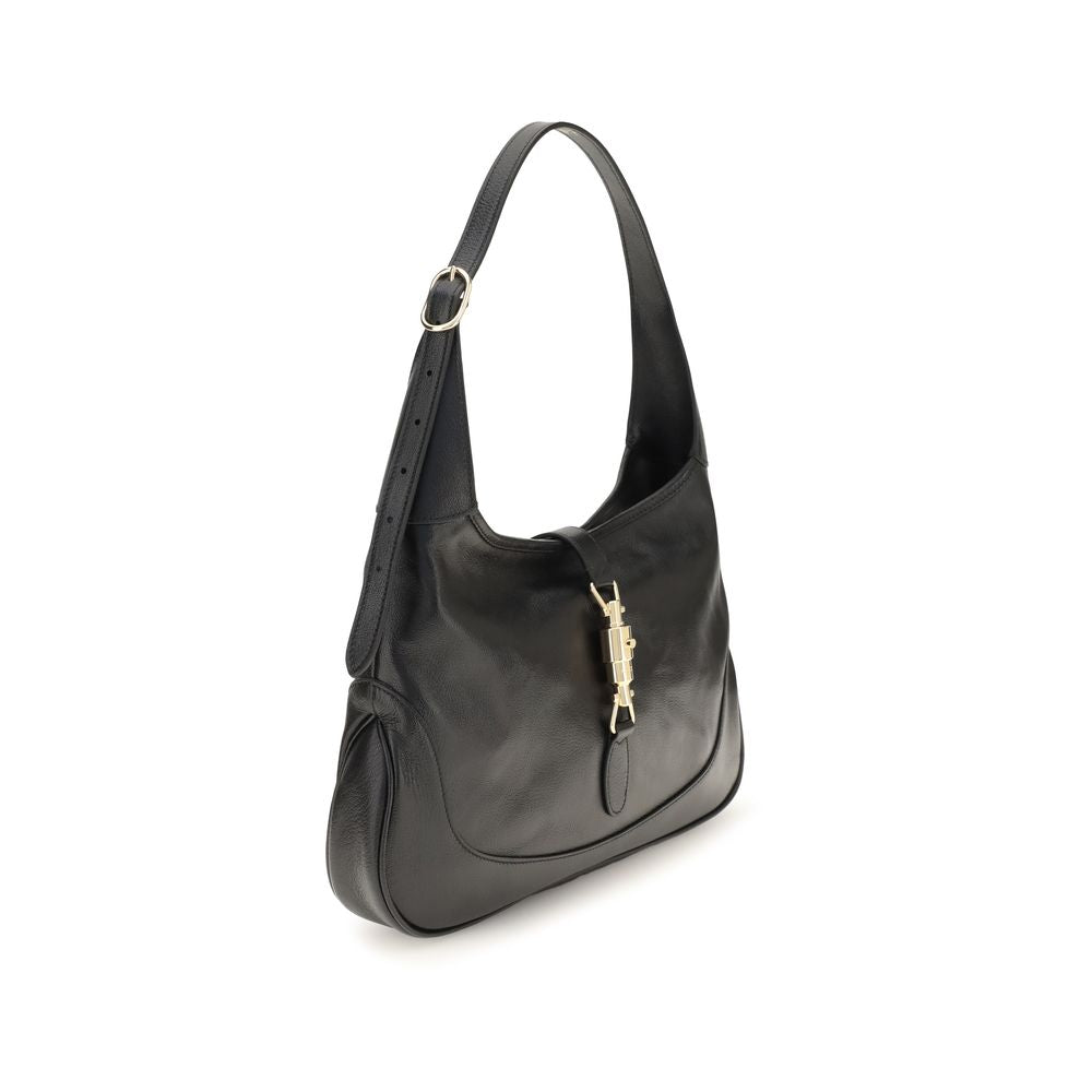 Medium Shoulder Bag by Gucci for women in bos taurus calf & lambskin grained leather black, gold, natural & signature showcases a enviable silhouette, artfully detailed with a secure zipper, organized , and versatile shoulder-strap & adjustable-strap for a enviable look.