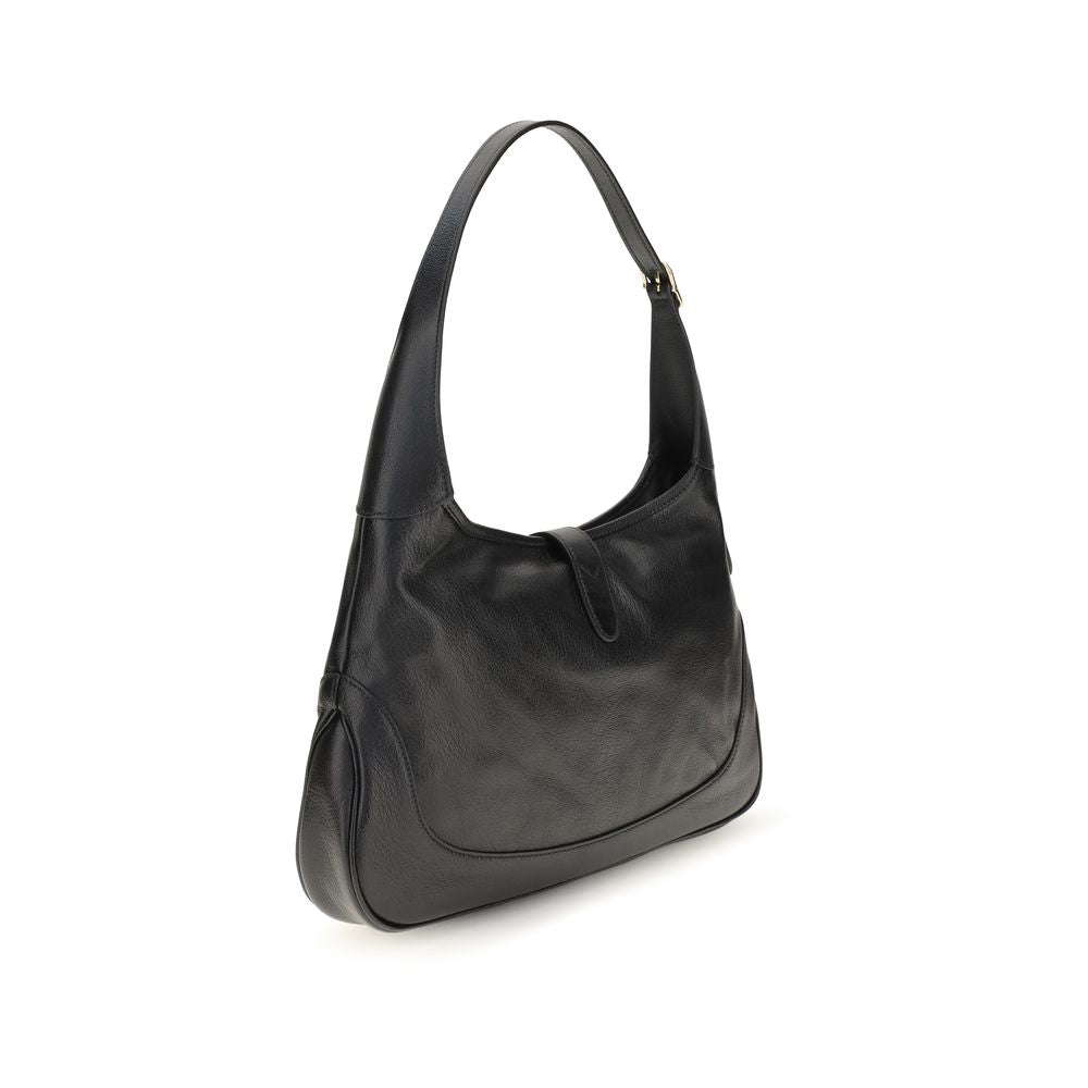 Medium Shoulder Bag by Gucci for women in bos taurus calf & lambskin grained leather black, gold, natural & signature showcases a enviable silhouette, artfully detailed with a secure zipper, organized , and versatile shoulder-strap & adjustable-strap for a enviable look.