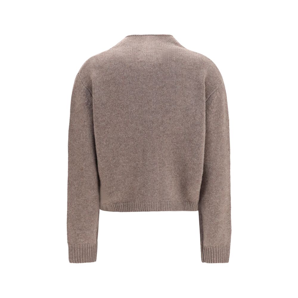 Cardigan by Lisa Yang for women in cashmere & capra leather beige presents a textural silhouette, artfully finished with a textural round neckline and for a sophisticated, textural look.