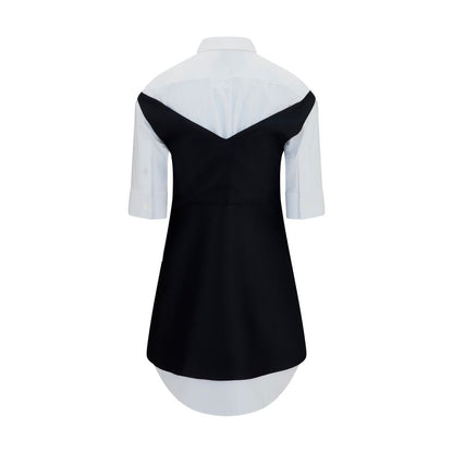 Dress by Balenciaga for women in silk & merino wool black & pearl features an cute silhouette, detailed with a and v-neck shirt-collar neckline that elegantly flows into a cute short mini.