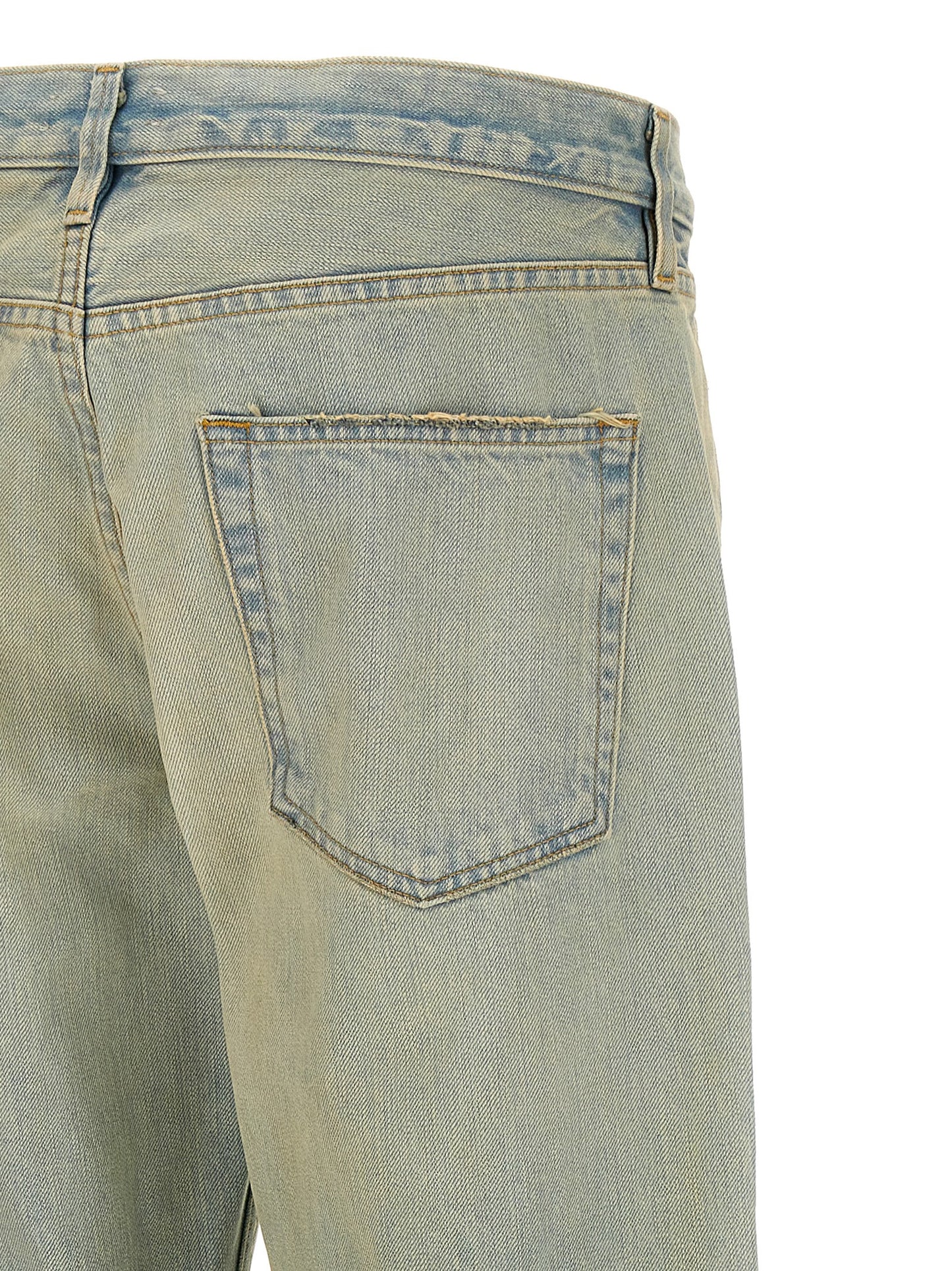 Jeans by Fear Of God for men in cotton denim light-blue presents a tailored silhouette, showcasing a tailored straight-leg and long cut with a refined for a truly tailored aesthetic.