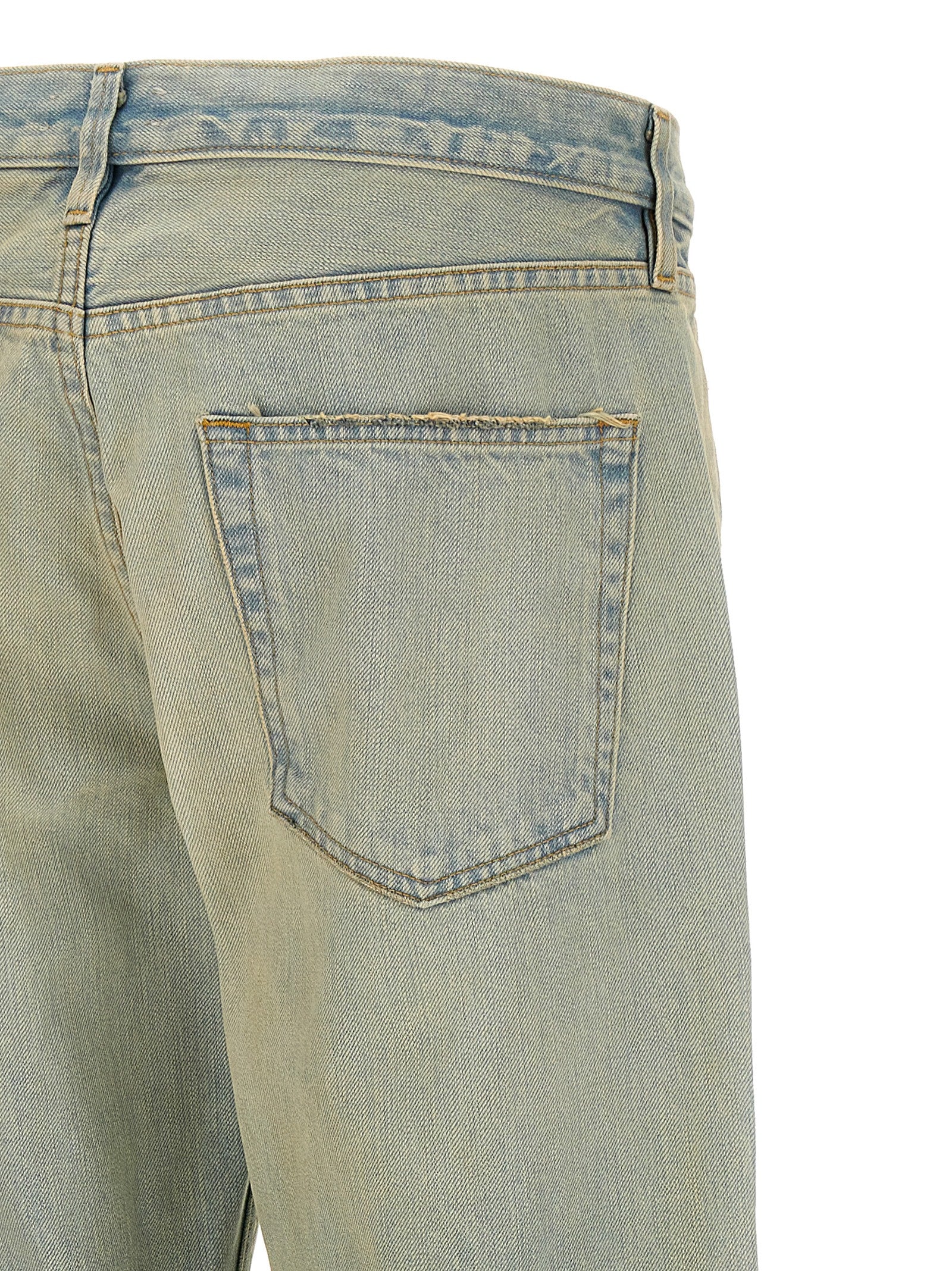 Jeans by Fear Of God for men in cotton denim light-blue presents a tailored silhouette, showcasing a tailored straight-leg and long cut with a refined for a truly tailored aesthetic.