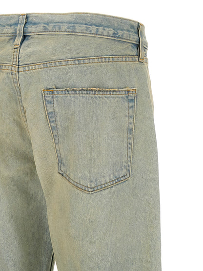 Jeans by Fear Of God for men in cotton denim light-blue presents a tailored silhouette, showcasing a tailored straight-leg and long cut with a refined for a truly tailored aesthetic.