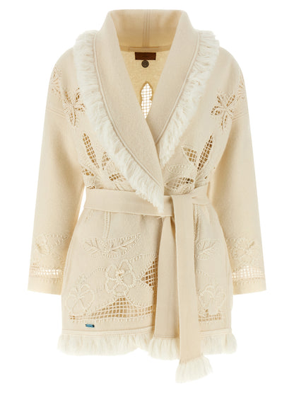 Cardigan by Alanui for women in virgin wool white showcases a captivating silhouette, artfully detailed with a captivating long-sleeve and wrap shawl-collar neckline for a truly sophisticated captivating look.