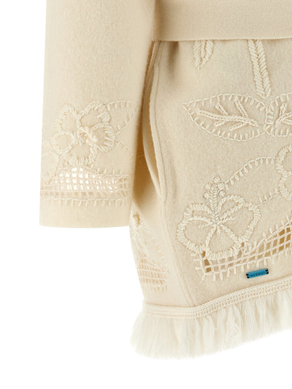 Cardigan by Alanui for women in virgin wool white presents a textural silhouette, artfully finished with a textural and for a sophisticated, textural look.
