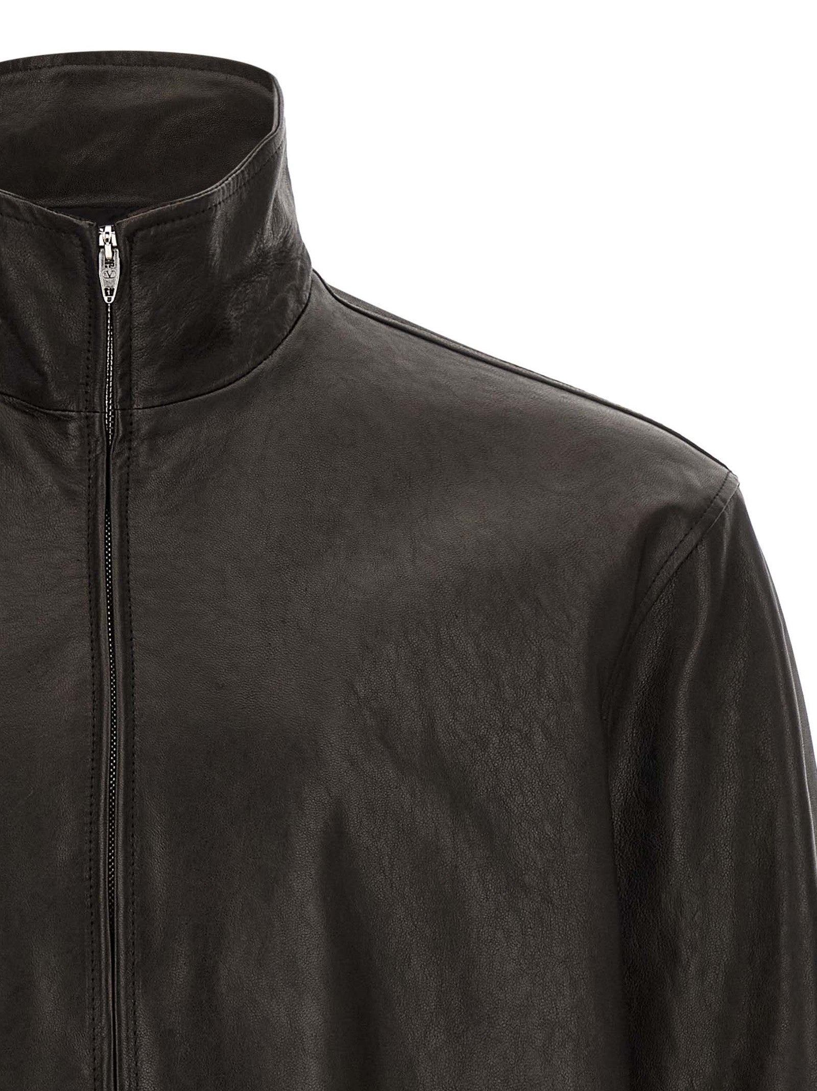 Jacket by Valentino Garavani for men in calfskin leather black, silver & signature showcases a contemporary silhouette, detailed with a contemporary and premium pockets for a sophisticated finish.