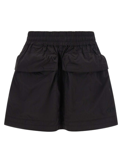 Skirt by Diesel for women in nylon black features an tailored silhouette, artfully capturing the essence of Women's Flared Nylon Skirt in a sophisticated mini long.