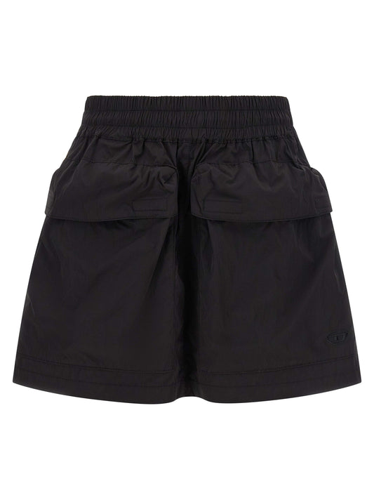 Skirt by Diesel for women in nylon black features an tailored silhouette, artfully capturing the essence of Women's Flared Nylon Skirt in a sophisticated mini long.