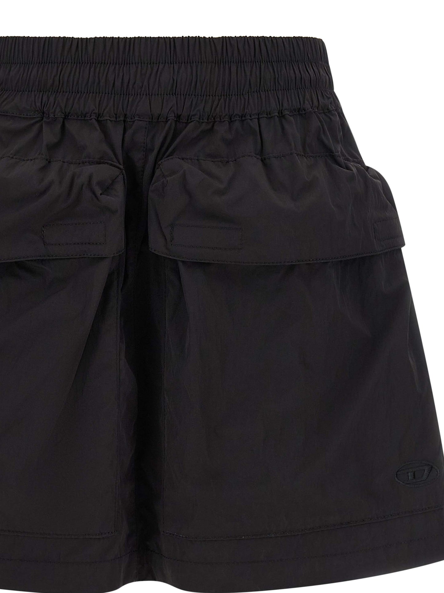 Skirt by Diesel for women in nylon black features a sublime silhouette, showcasing the sublime design of the Women's Flared Nylon Skirt in a sophisticated mini long.
