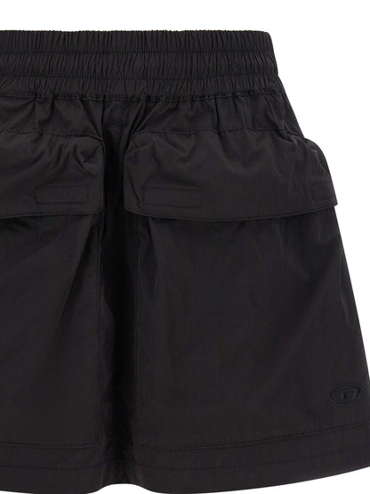 Skirt by Diesel for women in nylon black features a sublime silhouette, showcasing the sublime design of the Women's Flared Nylon Skirt in a sophisticated mini long.