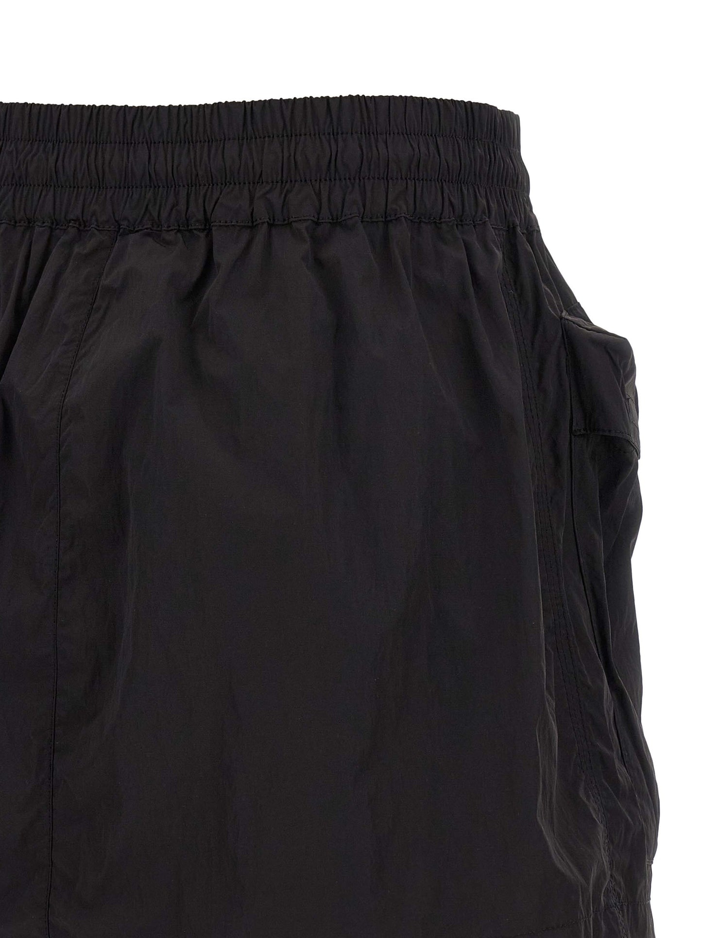 Skirt by Diesel for women in nylon black features an relaxed-yet-refined silhouette that elegantly showcases the Women's Flared Nylon Skirt design and sophisticated mini long.