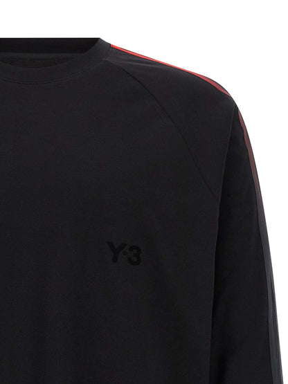 T-Shirt by Y-3 for men in cotton gradient, black, red & striped showcases a fashionable silhouette, elegantly detailed with a fashionable and crew neckline for a sophisticated, high-fashion look.