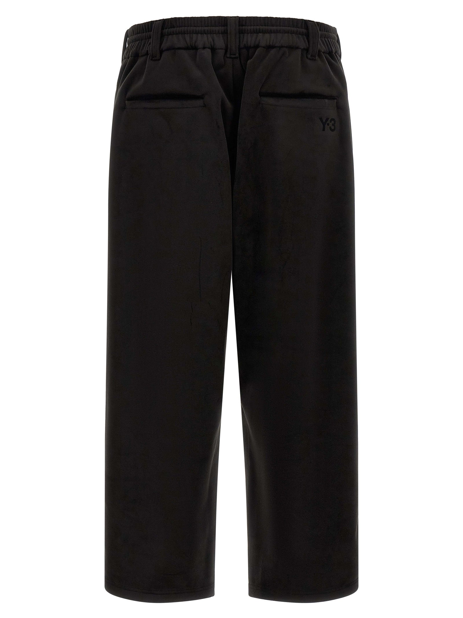 Joggers by Y-3 for men in stretch polyester black features an sophisticated and relaxed-fit, wide & cropped with a precise cropped, creating a sophisticated and sophisticated silhouette.