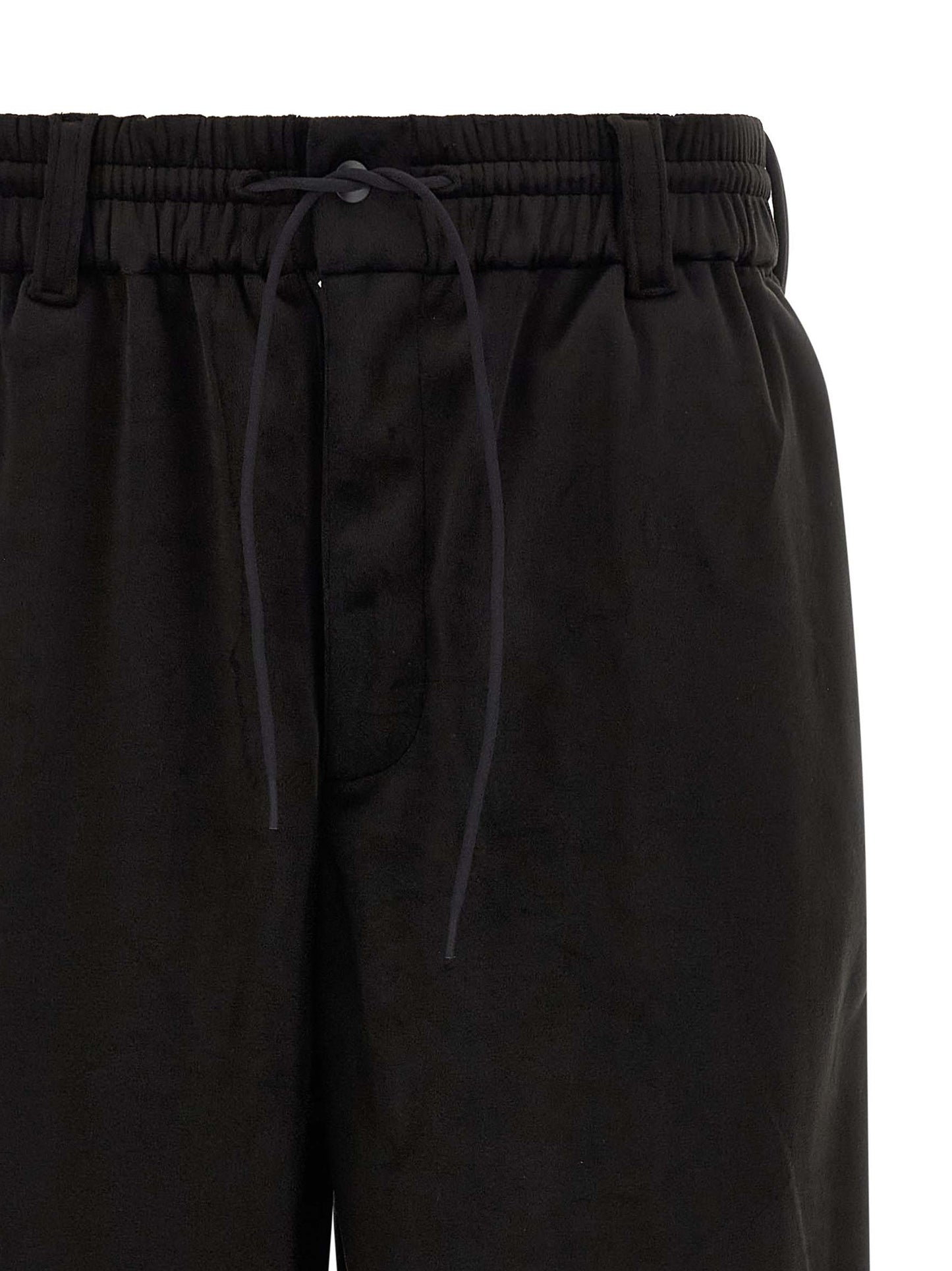 Joggers by Y-3 for men in stretch polyester black features a refined silhouette with a refined relaxed-fit, wide & cropped, defined by a and a refined cropped for a refined finish.