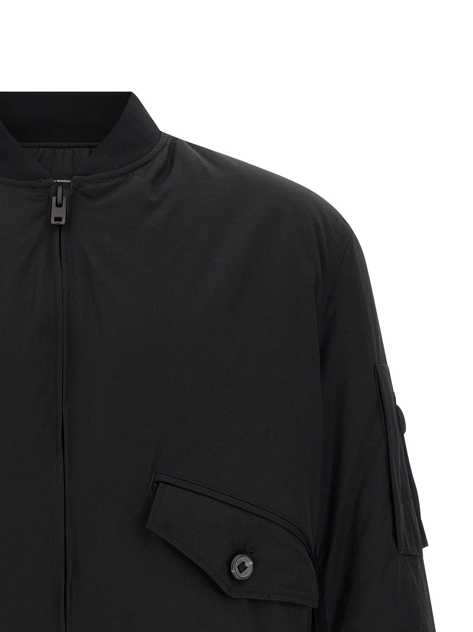 Bomber Jacket by Y-3 for men in polyamide twill black features an contemporary silhouette, showcasing a sophisticated and contemporary pockets for a truly refined look.