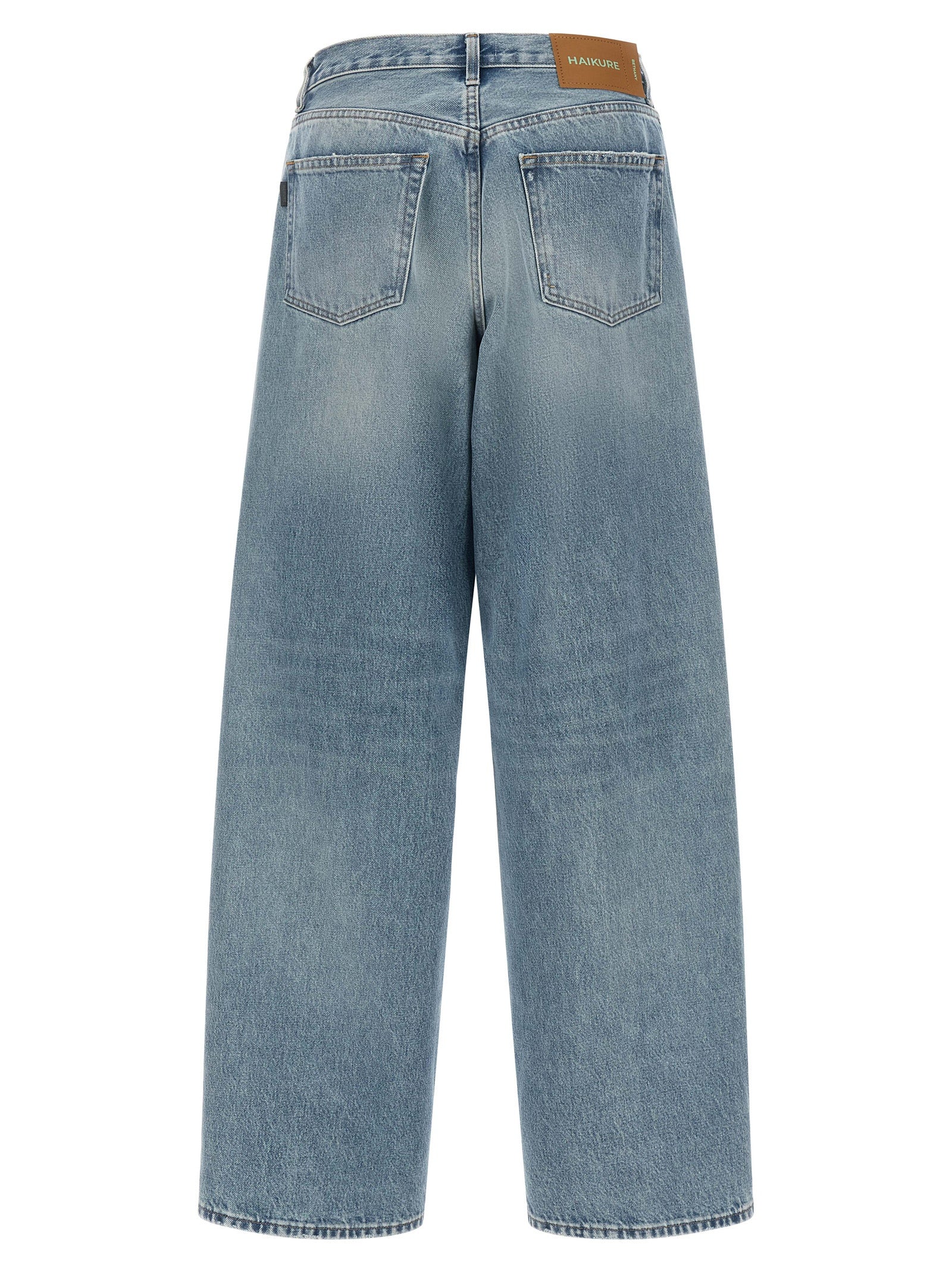 Jeans by Haikure for women in denim cotton canvas light-blue presents a refined pantology silhouette, artfully defined by a refined pantology relaxed-fit & wide, long, and a sophisticated .