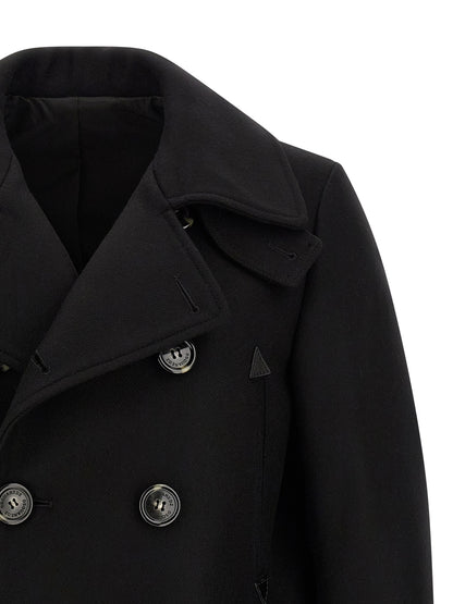 Overcoat by Dsquared² for men in polyamide wool black features a cosy chic silhouette, artfully detailed with a sophisticated and premium pockets for a cosy chic finish.