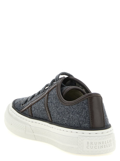 Sneakers by Brunello Cucinelli for women in virgin wool & leather gray & signature presents a sumptuous silhouette, artfully capturing the essence of the Monile Women's Low Top Virgin Wool & Leather Sneakers with its sumptuous low-top style design.
