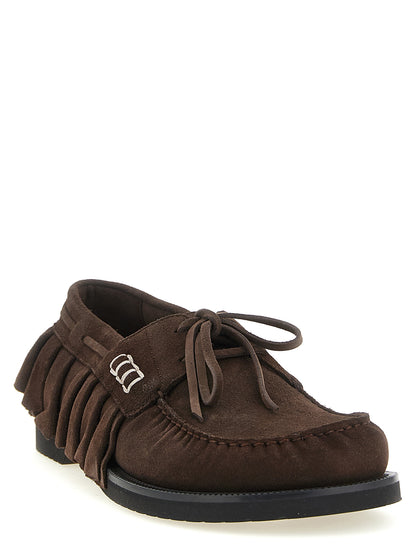 Boat Flat Shoes by J.W.Anderson for men in suede leather brown showcases a resplendent Men's Suede Leather Boat Flat Shoes aesthetic with a and .