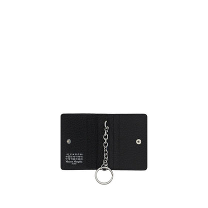 This Keychain by Maison Margiela for women in wool and black, silver & print showcases a couture-inspired aesthetic, meticulously highlighting the and with a finish.