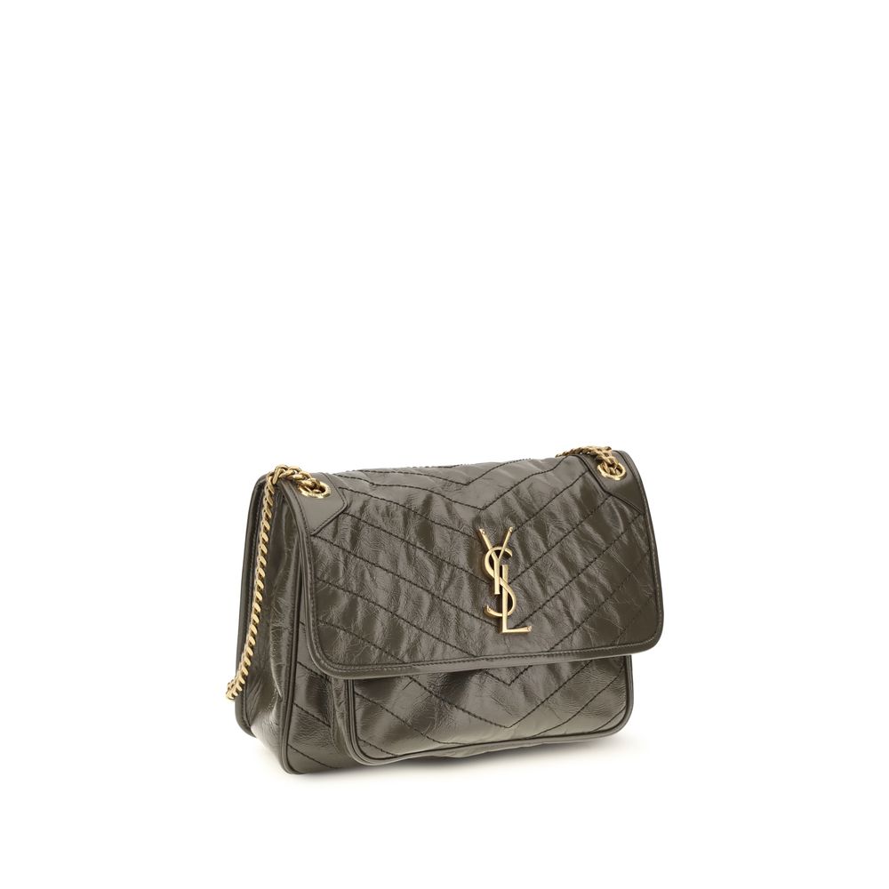 2-in-1 Shoulder & Crossbody Flap Bag by Saint Laurent for women in bos taurus calf leather bicolour, chevron & signature features a effortless sophistication silhouette, secured by a flap with ample built-in-compartments and versatile crossbody-strap & shoulder-strap for a effortless sophistication finish.