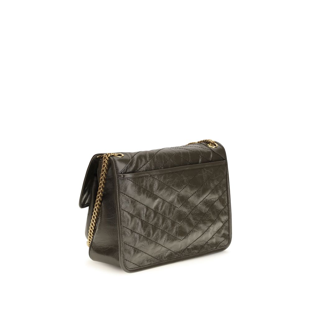 2-in-1 Shoulder & Crossbody Flap Bag by Saint Laurent for women in bos taurus calf leather bicolour, chevron & signature presents a versatile silhouette, showcasing a secure flap and versatile built-in-compartments with versatile crossbody-strap & shoulder-strap for a sophisticated look.
