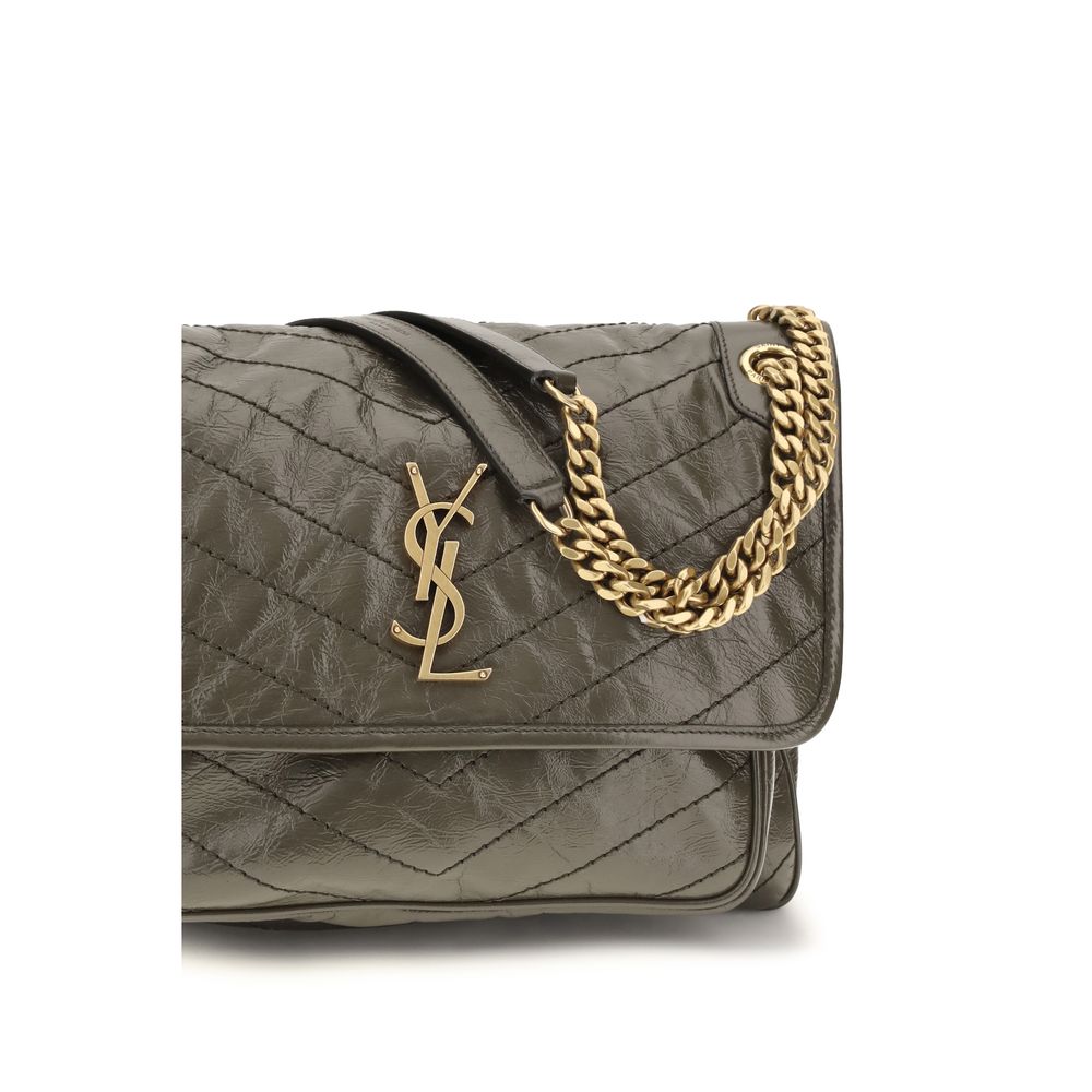 2-in-1 Shoulder & Crossbody Flap Bag by Saint Laurent for women in bos taurus calf leather bicolour, chevron & signature features a effortless chic silhouette with a secure flap, ample built-in-compartments, and versatile crossbody-strap & shoulder-strap for a effortless chic finish.
