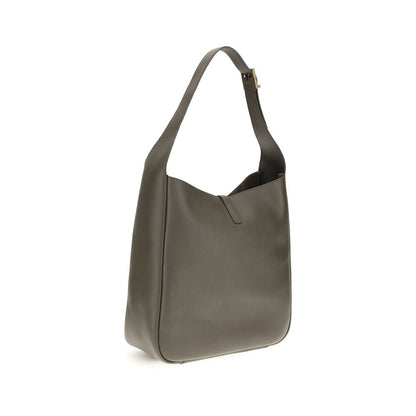 Shoulder Flap Bag by Saint Laurent for women in bos taurus calf grained & suede leather bicolour features a effortless chic silhouette with a secure flap, zipper & hook, ample single-compartment, and versatile shoulder-strap, handle & adjustable-strap for a effortless chic finish.